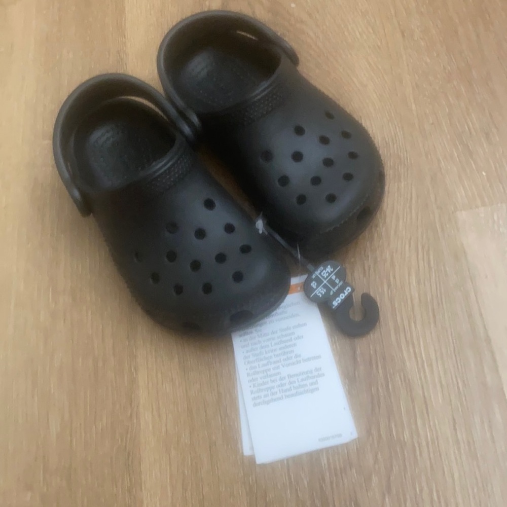 New crocs  with tags size c8 .